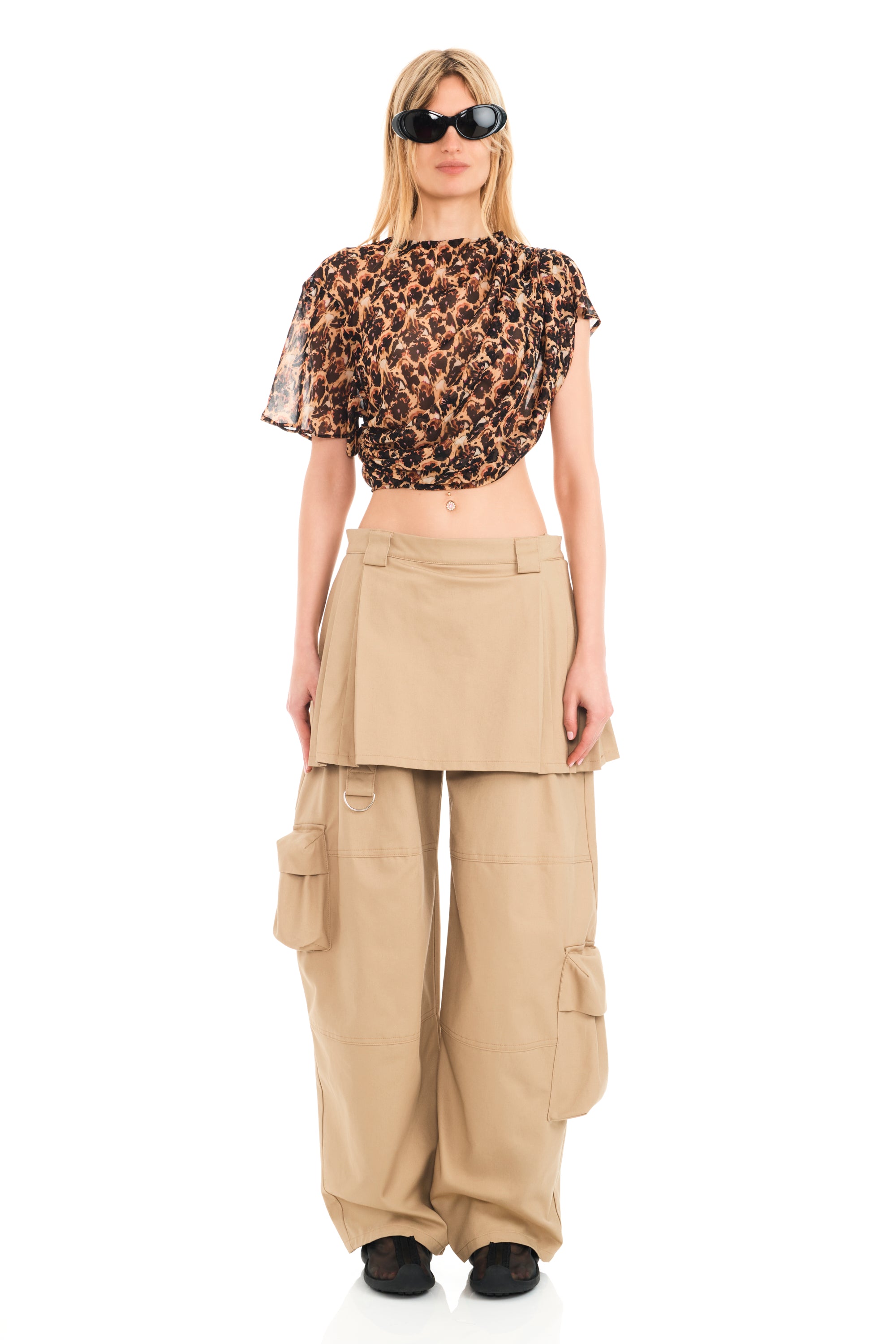 Our iconic cargo pant with attached pleated skirt. Zipper opening at side.