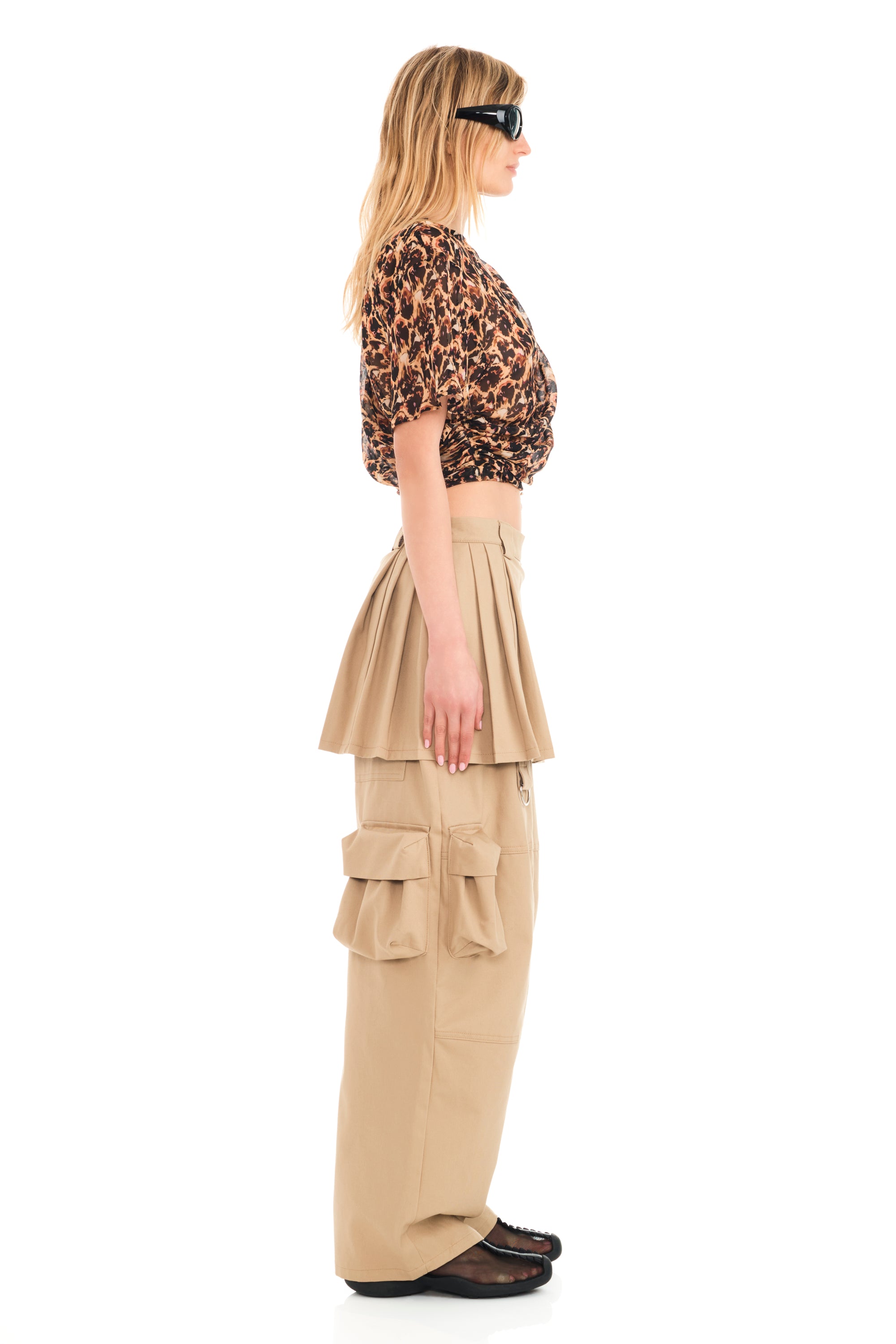 Our iconic cargo pant with attached pleated skirt. Zipper opening at side.