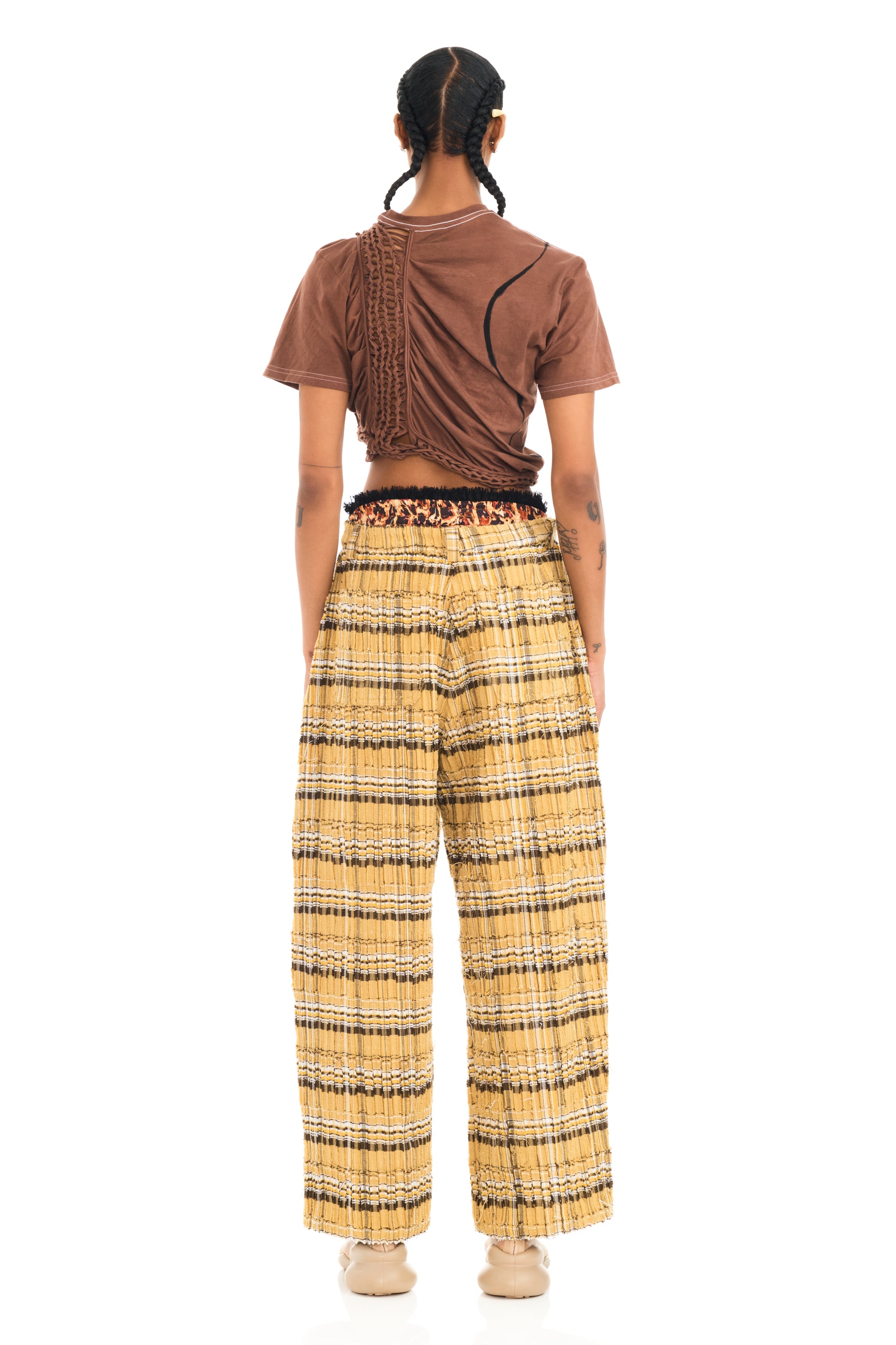 Cropped t-shirt with knitted braiding details and design on front. Hand painted.