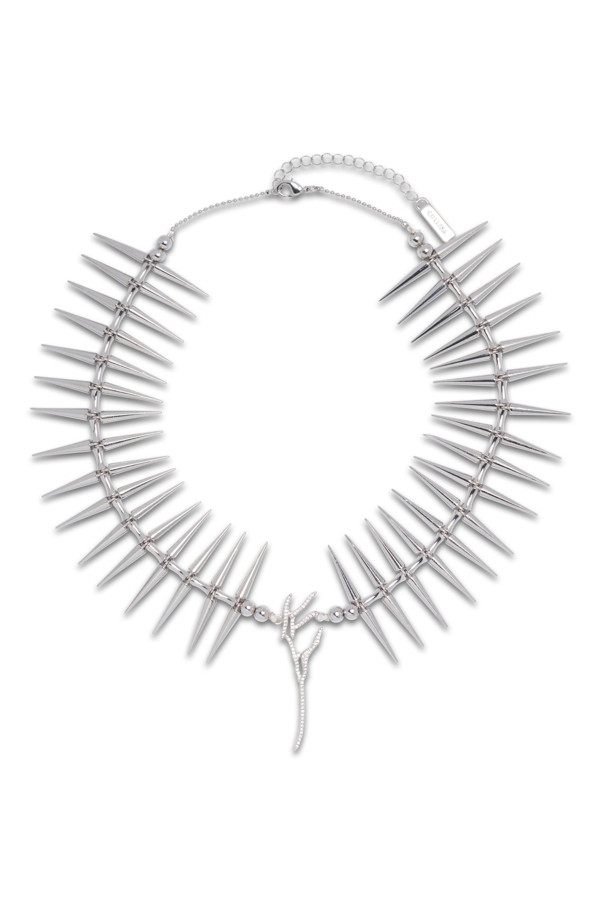 Spiky necklace with crystal pave wing at center. Swarovski crystals and plated brass.