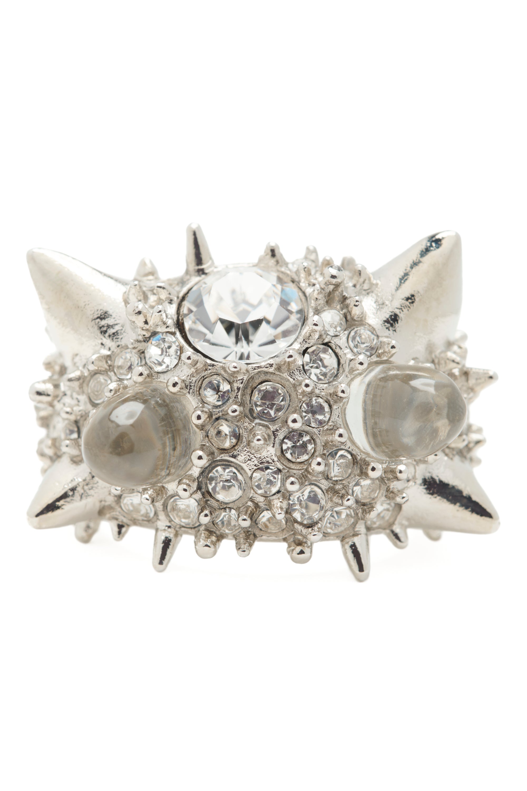 Silver spiked ring with clear gemstones on a white background