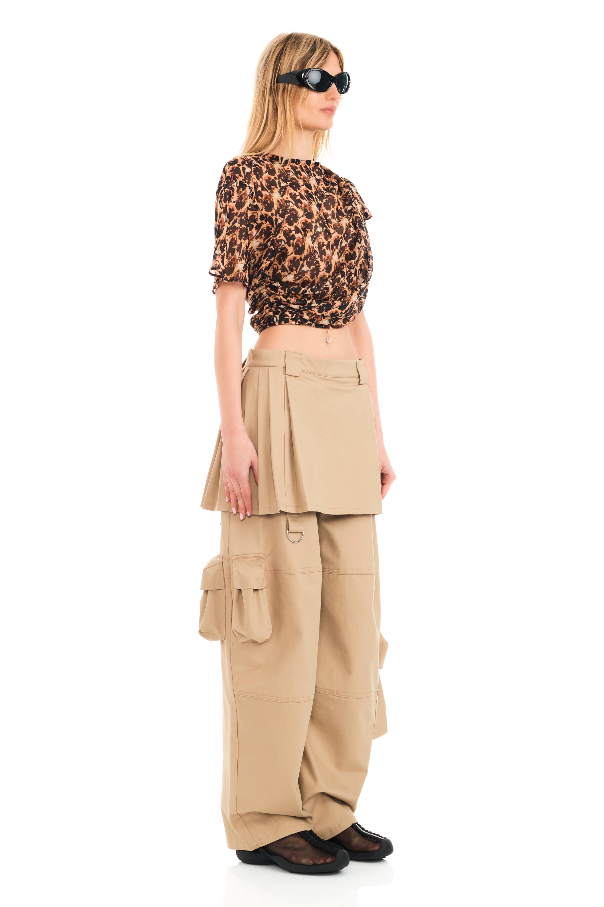 Our iconic cargo pant with attached pleated skirt. Zipper opening at side.