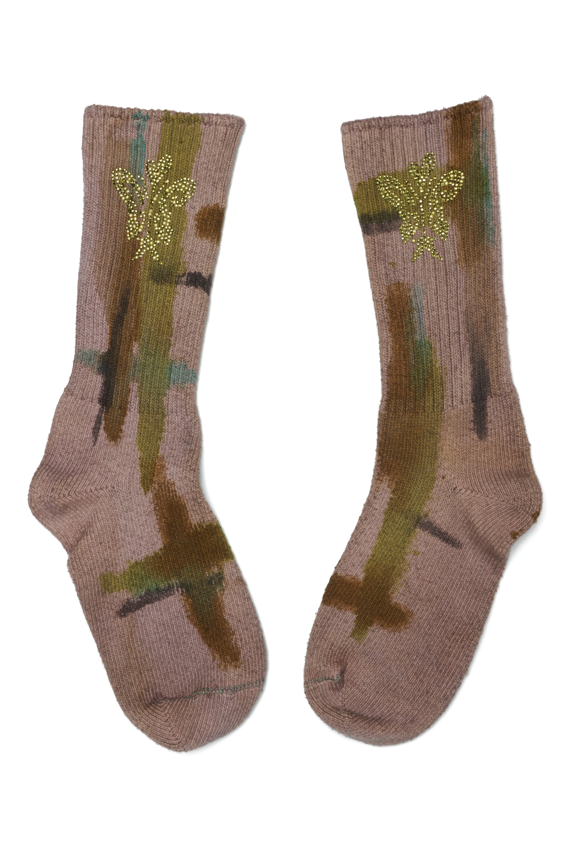 Pair of painted socks with rhinestone designs on a white background