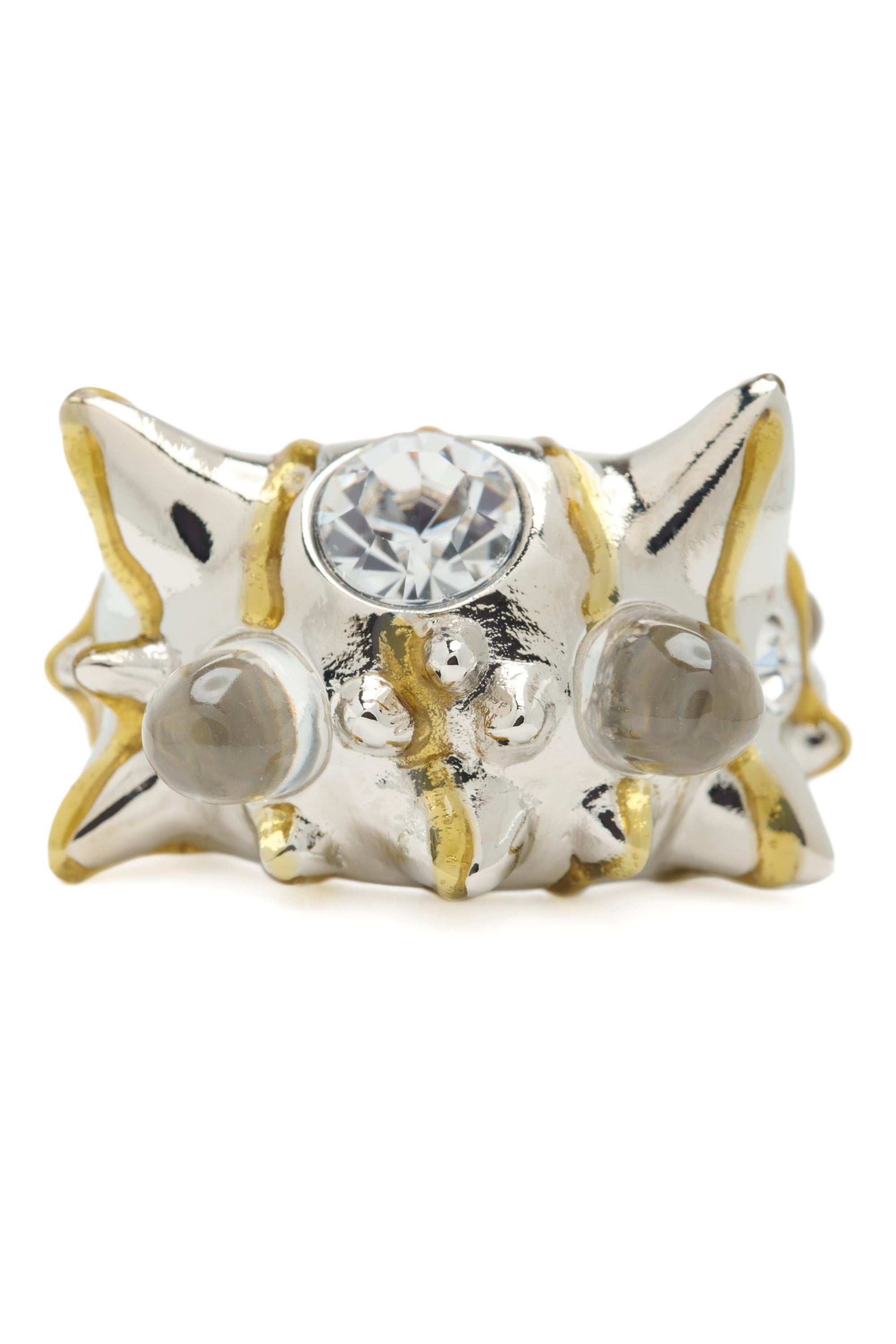 Spiky ring with gold stripes and clear gemstones on a white background