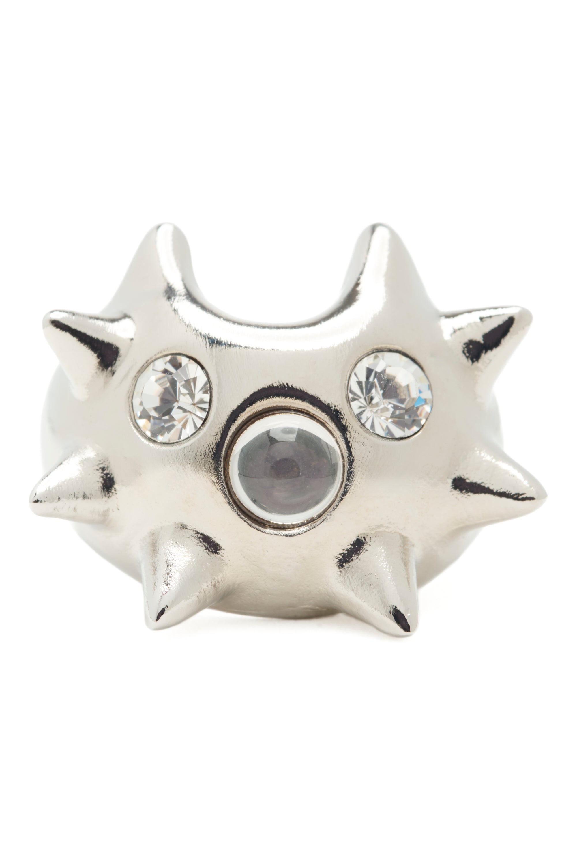 Silver spiked ring with clear gemstones on a white background